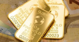 Gold price falls on easing trade worries, silver price rises.